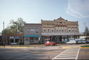 104 JANESVILLE ST, a Romanesque Revival retail building, built in Oregon, Wisconsin in 1898.