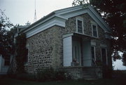 5924 STATE HIGHWAY 83, a Greek Revival house, built in Waterford, Wisconsin in 1850.