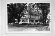 23212 WASHINGTON AVENUE / STATE HIGHWAY 20, a Queen Anne house, built in Dover, Wisconsin in 1905.