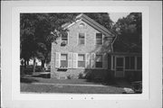 132 W JEFFERSON, a Greek Revival house, built in Burlington, Wisconsin in 1854.