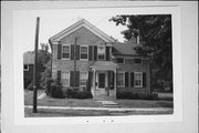 309-311 MILWAUKEE, a Greek Revival house, built in Burlington, Wisconsin in .