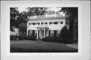 117 E STATE ST, a Greek Revival house, built in Burlington, Wisconsin in 1846.