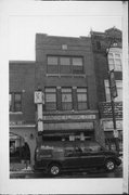 219 6TH ST, a Prairie School small retail building, built in Racine, Wisconsin in 1915.