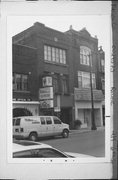 219 6TH ST, a Prairie School retail building, built in Racine, Wisconsin in 1915.