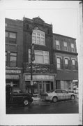 221 6TH ST, a Commercial Vernacular small retail building, built in Racine, Wisconsin in 1881.
