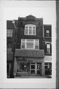 221 6TH ST, a Commercial Vernacular small retail building, built in Racine, Wisconsin in 1881.