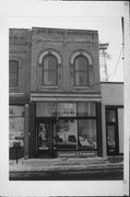 409 6TH ST, a Commercial Vernacular retail building, built in Racine, Wisconsin in 1865.