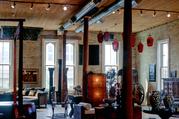 320 E CLYBOURN AVE, a Italianate large retail building, built in Milwaukee, Wisconsin in 1874.