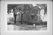 1201-1203 COLLEGE AVE, a Greek Revival house, built in Racine, Wisconsin in 1857.