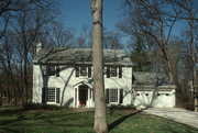 1506 WOOD LANE, a Colonial Revival/Georgian Revival house, built in Shorewood Hills, Wisconsin in 1937.