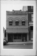 237 MAIN ST, a Romanesque Revival small retail building, built in Racine, Wisconsin in 1902.
