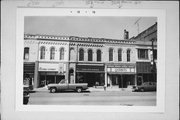 320 MAIN ST, a Italianate small retail building, built in Racine, Wisconsin in 1869.