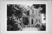 1221 N MAIN ST, a Greek Revival house, built in Racine, Wisconsin in 1855.