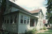 101 S 5TH ST, a Greek Revival house, built in Stoughton, Wisconsin in 1859.