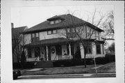 2313-2317 WASHINGTON AVE, a American Foursquare duplex/two-flat, built in Racine, Wisconsin in 1910.