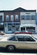 143-147 E MAIN ST, a Commercial Vernacular small retail building, built in Stoughton, Wisconsin in 1889.