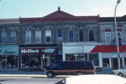 175 E MAIN, a Italianate large retail building, built in Stoughton, Wisconsin in 1889.