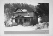 15989 U.S. HIGHWAY 14, a American Foursquare house, built in Akan, Wisconsin in 1915.
