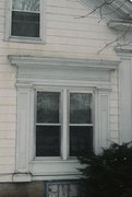 217 S PRAIRIE ST, a Greek Revival house, built in Stoughton, Wisconsin in 1855.