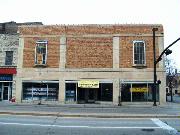 227-231 E WALNUT ST, a Art Deco retail building, built in Green Bay, Wisconsin in 1902.