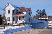 552 N MADISON ST, a Queen Anne house, built in Lancaster, Wisconsin in 1890.