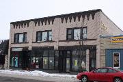 126- 128 W PULASKI ST, a Commercial Vernacular large retail building, built in Pulaski, Wisconsin in 1924.