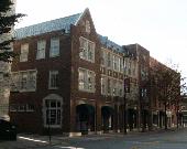 306-314 PINE ST, a English Revival Styles large retail building, built in Green Bay, Wisconsin in 1928.