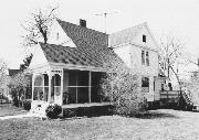 467 W 1ST ST, a Queen Anne house, built in New Richmond, Wisconsin in 1895.