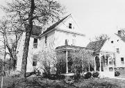 467 W 1ST ST, a Queen Anne house, built in New Richmond, Wisconsin in 1895.