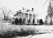 112 S DAKOTA AVE, a American Foursquare house, built in New Richmond, Wisconsin in 1912.