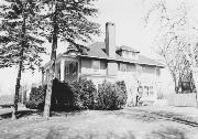 112 S DAKOTA AVE, a American Foursquare house, built in New Richmond, Wisconsin in 1912.