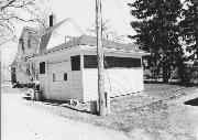 326 W 2ND ST, a Dutch Colonial Revival house, built in New Richmond, Wisconsin in 1900.