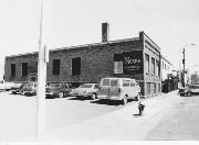 145 W 2ND ST, a Commercial Vernacular small office building, built in New Richmond, Wisconsin in 1913.