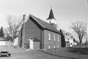 354 N 3RD ST, a Early Gothic Revival house of worship, built in New Richmond, Wisconsin in 1906.