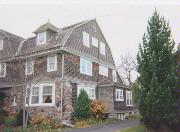 433 E WISCONSIN AVE, a Shingle Style house, built in Neenah, Wisconsin in 1904.
