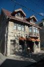 1218-1220 E BRADY ST, a Arts and Crafts funeral home, built in Milwaukee, Wisconsin in 1916.