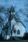 PEARL ST, a Early Gothic Revival church, built in Merrillan, Wisconsin in 1878.