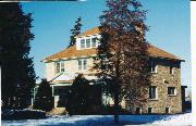 1230 E BROADWAY, a American Foursquare house, built in Waukesha, Wisconsin in 1931.