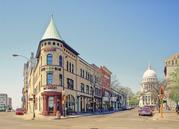 121-125 KING ST (106 E DOTY ST), a Romanesque Revival retail building, built in Madison, Wisconsin in 1889.