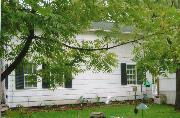 306 MILTON AVE, a Greek Revival house, built in Janesville, Wisconsin in 1845.