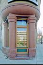 121-125 KING ST (106 E DOTY ST), a Romanesque Revival retail building, built in Madison, Wisconsin in 1889.