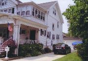 114 JEFFERSON AVE, a Queen Anne house, built in Janesville, Wisconsin in 1908.