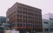 301 W WISCONSIN AVE, a Romanesque Revival retail building, built in Milwaukee, Wisconsin in 1892.