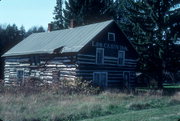 N2610 LOG CABIN DR, a Front Gabled house, built in Wolf River, Wisconsin in 1874.