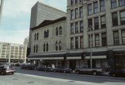 131-137 E WELLS ST, a Italianate large retail building, built in Milwaukee, Wisconsin in 1870.