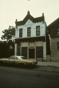 2034-2036 N Doctor Martin Luther King Jr Dr (AKA 2034-2036 N 3RD ST), a Commercial Vernacular small retail building, built in Milwaukee, Wisconsin in 1885.