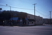 121 N CASCADE ST (AKA 102 2ND AVE), a Commercial Vernacular small retail building, built in Osceola, Wisconsin in 1904.
