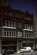 725-729 N MILWAUKEE ST, a Queen Anne retail building, built in Milwaukee, Wisconsin in 1881.