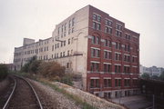 133 W OREGON ST, a Romanesque Revival warehouse, built in Milwaukee, Wisconsin in 1904.