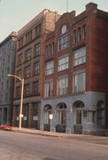 221 E BUFFALO AVE, a Romanesque Revival small office building, built in Milwaukee, Wisconsin in 1893.